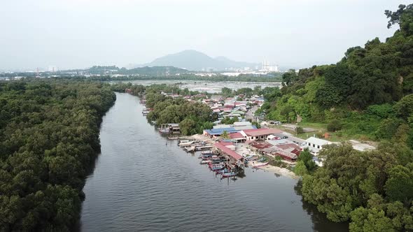 Fly towards Malays fishing village at Kuala Juru