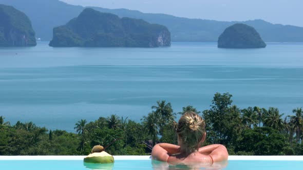 Woman in an Infinity Pool in Thailand