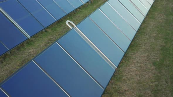 Drone Over Blue Solar Panels In Field