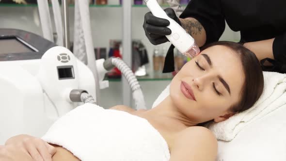 Pretty Woman Having Beauty Shape Procedures for Her Face