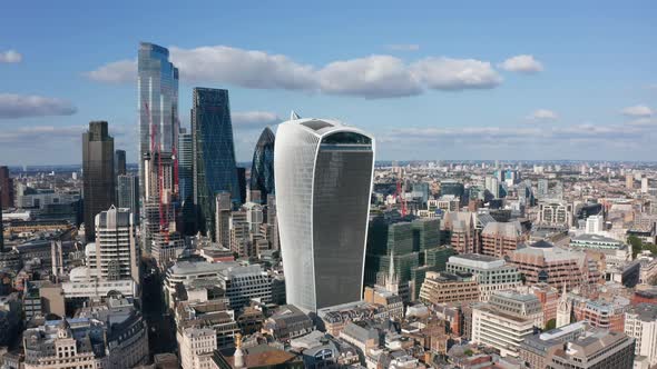 Group of Skyscrapers in City Financial District Distinctively Protruding Above Other Buildings in