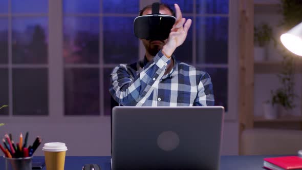 Young Businessman Using Virtual Reality Goggles