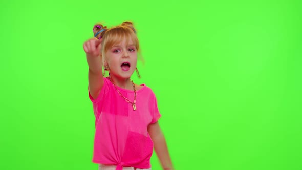 Cheerful Funny Little Teen Girl Kid Dancing at Camera Filming Video Using Phone on Chroma Key Wall