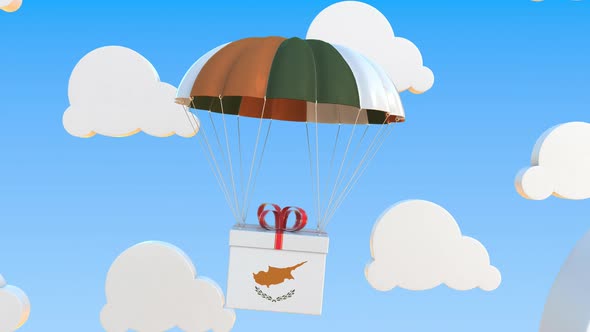 Box with National Flag of Cyprus Falls with a Parachute