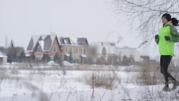 Woman Jogging in Winter