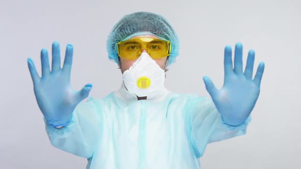 Medical Scientist in Blue Gloves Prevent Spreading Virus By Distancing and Protection Equipment