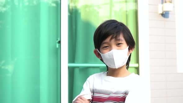 Cute Asian Child Wearing Face Mask