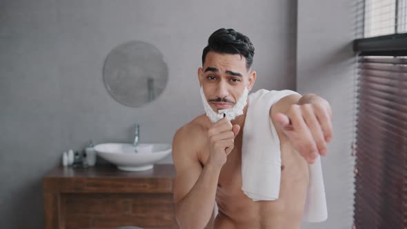 Cheerful Funny Goofy Handsome Arab Man Guy with White Soap Suds on Beard Naked Male with Towel on