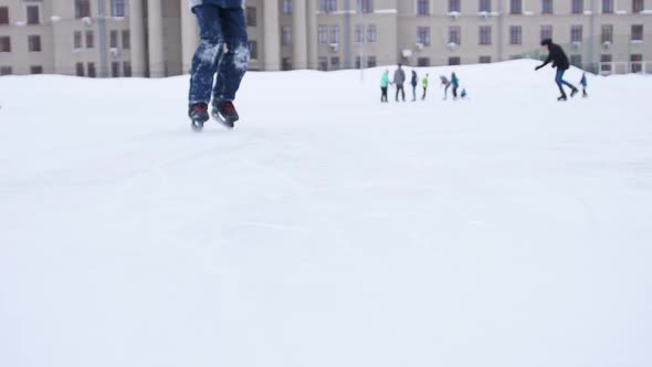 The Blade of the Skates Cuts Through the Ice