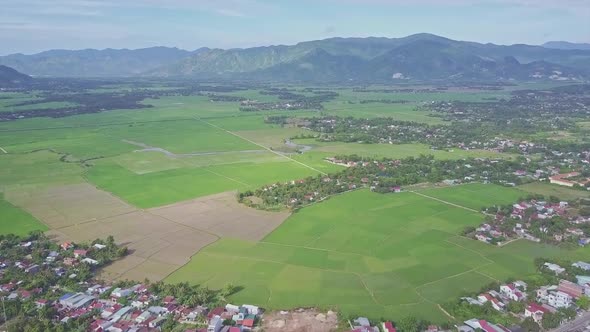 Upper Aerial View Villages Around Rice Fields Against Hills