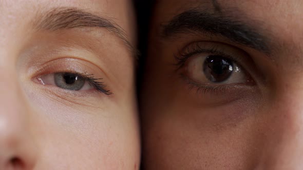 Blue and Brown Eyes of Young White Woman and Muslim Man