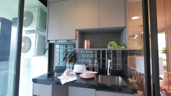 Stylish Apartment or Condominium Kitchen Area Decoration Idea With Dark Tone Ceramic Tiles