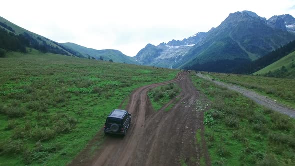 Suv Rides On A Mountain Road 7