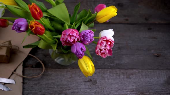 A Bouquet of Tulips Wrapped in Craft Paper