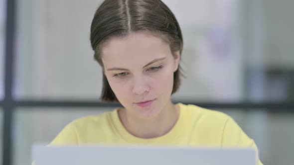 Close Up of Woman Working on Laptop