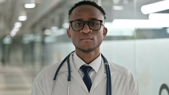 Portrait of African Doctor Looking at the Camera 