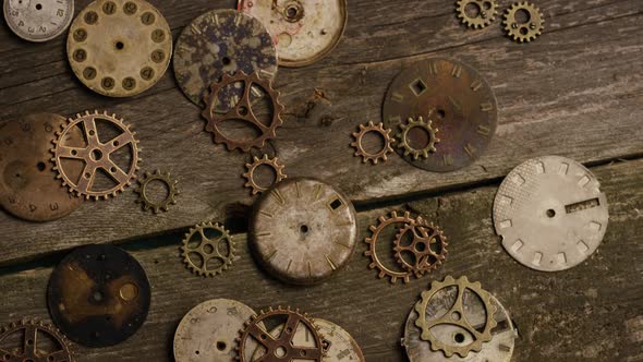 Rotating stock footage shot of antique and weathered watch faces