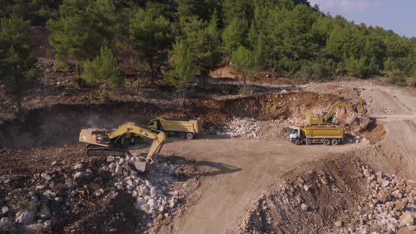 Heavy Machinery Working at Mountain Quarry