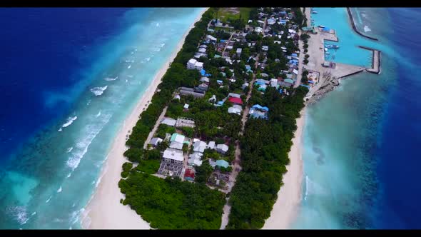 Aerial top down texture of tranquil resort beach time by clear ocean with white sandy background of 