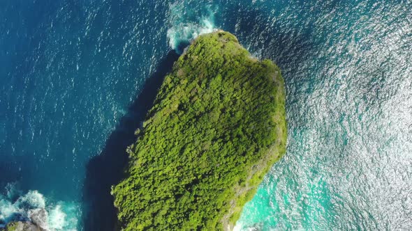 Drone Shot By Drone Ocean with Waves and Rocky Cliff Bali, Indonesia. Aerial View of Big Blue Sea