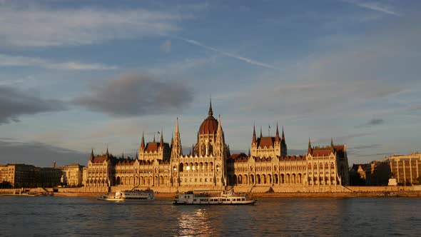 Sunset with cruise ships and the Hungarian Parliament Building