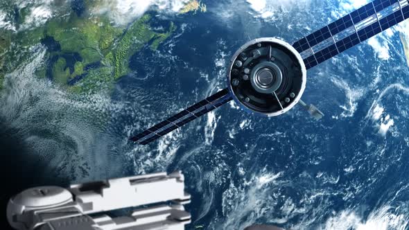 artificial satellite of the earth. a satellite flying in space over the globe