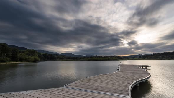 Timelapse of lake Gruentensee with jetty in Bavaria, Germany