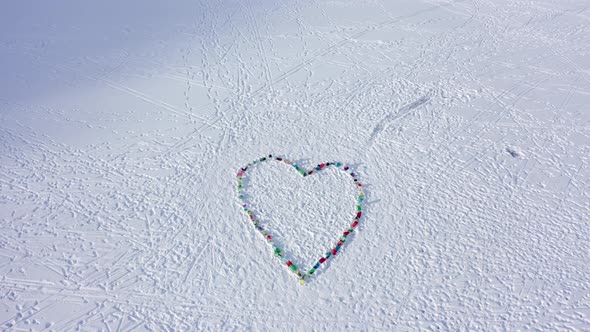 Aerial Top view heart shape on ice made by children, Positive message it will get better - Covid 19