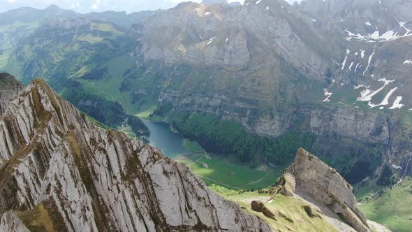 Aerial shot of Seealpsee lake in the Alpstein range, Appenzell Alps, Switzerland