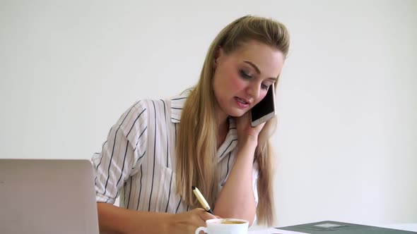 Blonde Business Woman Working at Modern Office