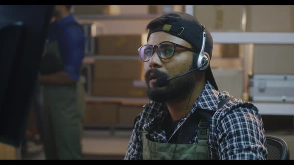 Young Man Working in a Distribution Center