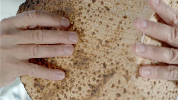 Breaking Matzah on Jewish festival of Passover - Super slow motion