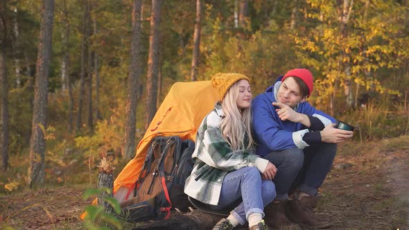 Lovely Caucasian Couple Is Enjoying Time on Mountains.