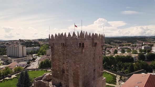 Aerial orbiting around Homage tower of Chaves medieval castle in Portugal