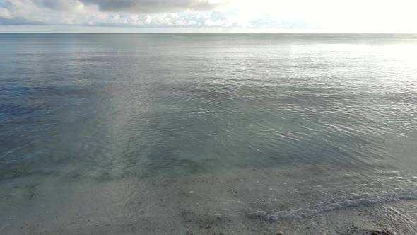 Zanzibar Tanzania  Aerial View of the Ocean Near the Shore of the Island Slow Motion