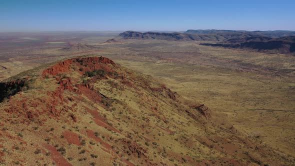 Summit of Mt Bruce, Karijini National Park, Western Australia Sunrise Sunset 4K Aerial Drone