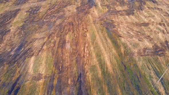 Aerial View of Scattered Pile of Manure on a Farm Field