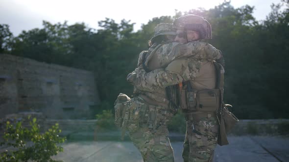 Brothers in Arms Meeting After Combat at Sunset