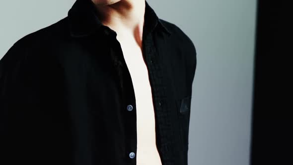 Androgynous man posing in studio