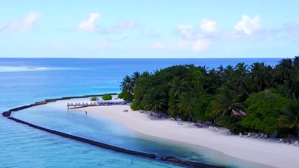 Drone view landscape of resort beach voyage by water with sand background