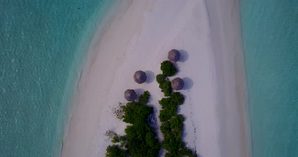 Natural aerial abstract shot of a white paradise beach and blue sea background in colourful