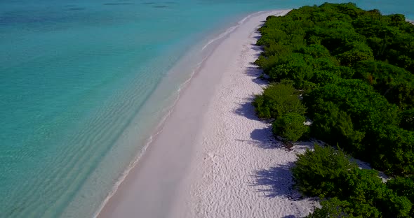 Tropical aerial abstract shot of a sunshine white sandy paradise beach and aqua turquoise water back