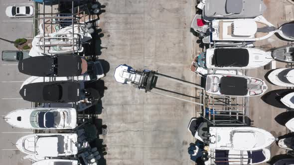  Aerial Top Down View on Elevator Approaching the Parked Yacht, Miami, Florida