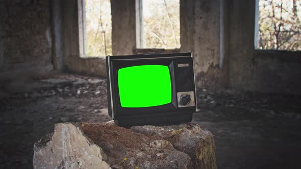 Vintage Tv Television Green Screen. Zooming Into Green Screen of an Old Television Vintage Style 