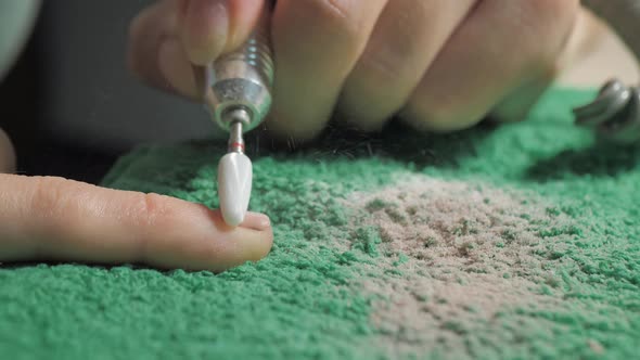 Manicurist Removes Nail Polish Drill with a Typewriter