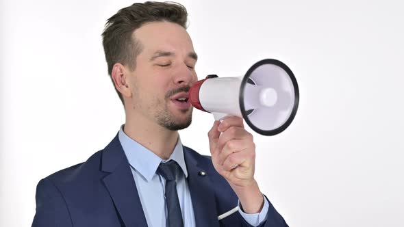 Portrait of Young Man Making Announcement on Loudspeaker , White Background