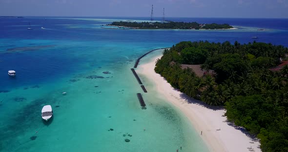 Wide drone abstract shot of a summer white paradise sand beach and turquoise sea background in colou