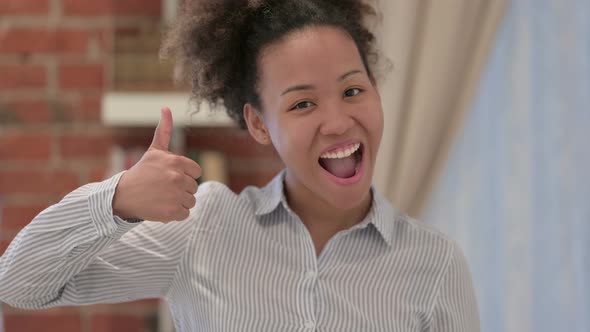 Portrait of African American Woman Showing Thumbs Up Sign