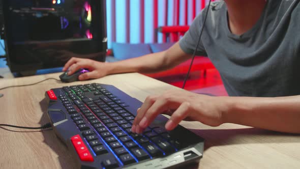 Hands Of Gamer Man Playing Video Games On Computer