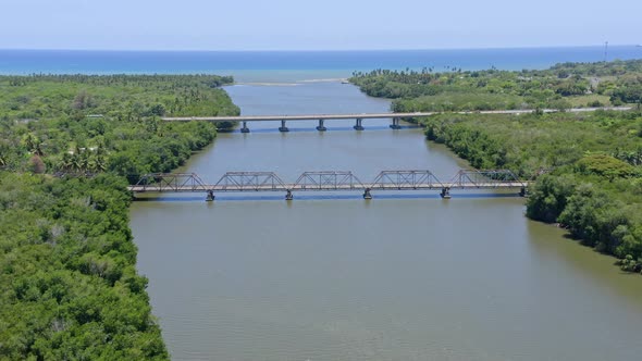 Aerial View Of The Former Bridge With The New Bridge Over Rio Soco At San Pedro de Macoris In The Do